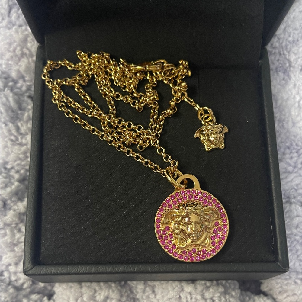 Versace Gold Necklace with Pink Crystals around Medusa Head Pendant